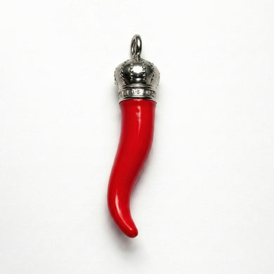 Red horn-shaped pendant with silver top on a white background