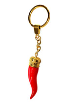 Red Horn Keychain in Gold in White Background